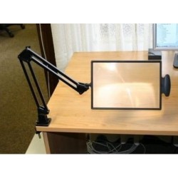 Table-top magnifier mounted...